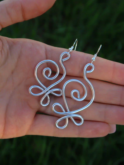 Geschwungene Spiral Statement Ohrringe
