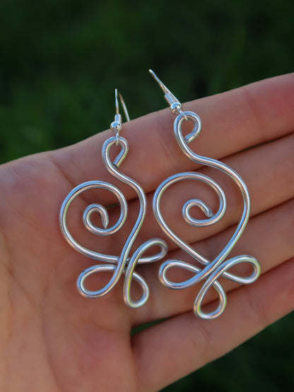Geschwungene Spiral Statement Ohrringe