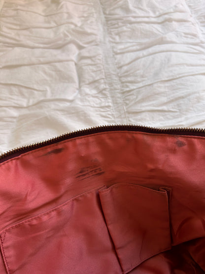 Elegante Coach Handtasche Burgunderrotes Lackleder & Gold-Details
