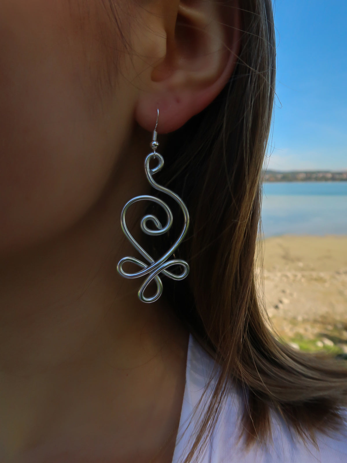 Geschwungene Spiral Statement Ohrringe